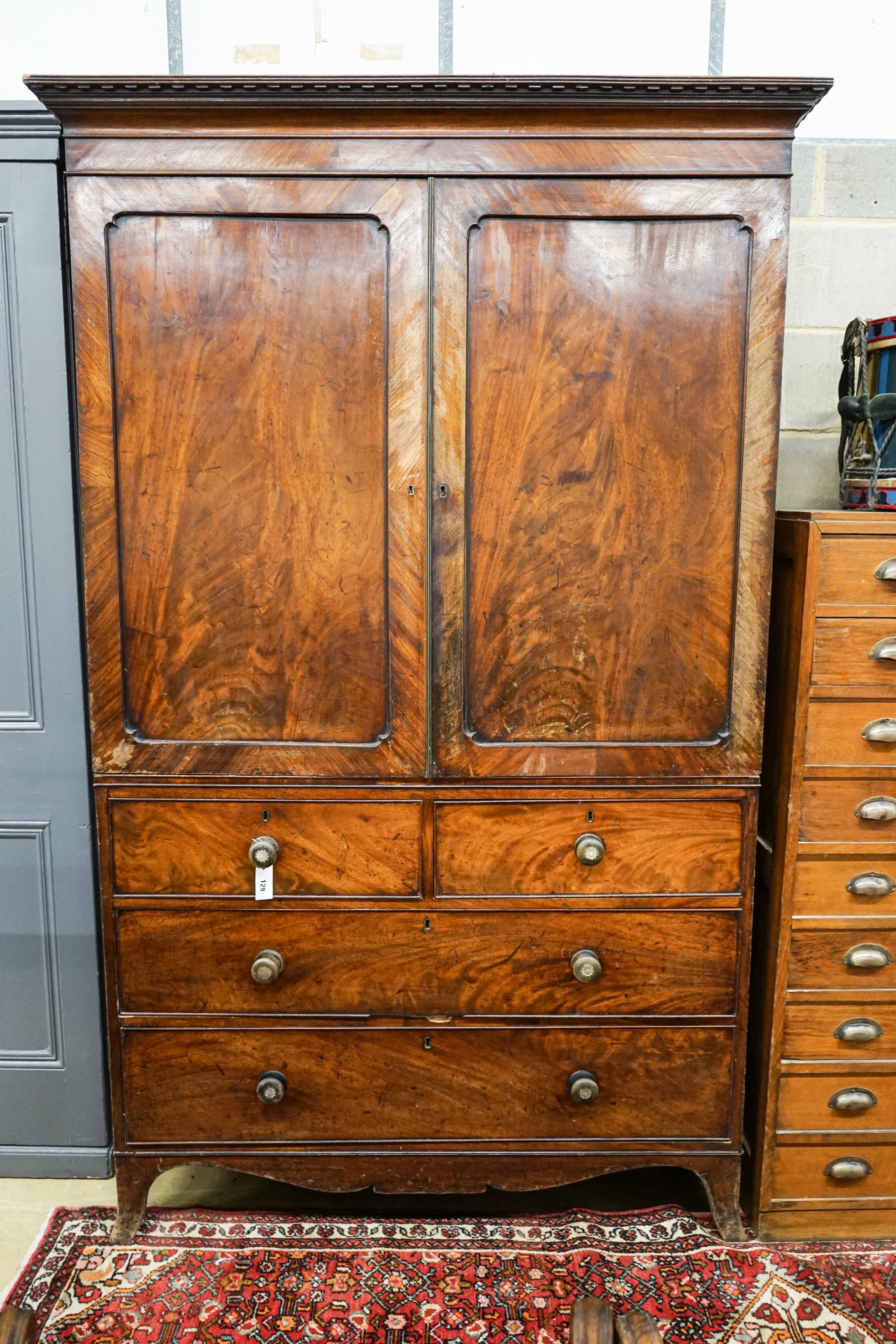 A Regency mahogany linen press, length 124cm, depth 58cm, height 212cm